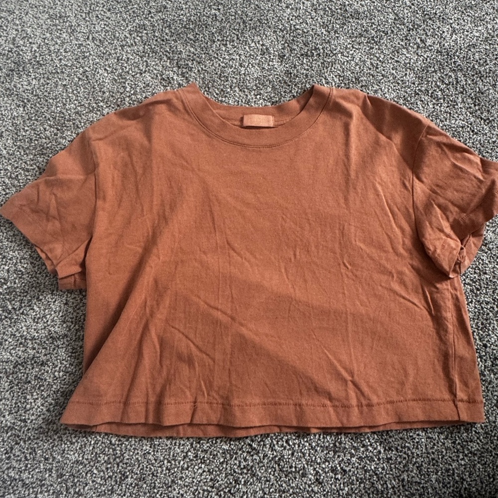 Nuuds Terracotta colored cropped shirt